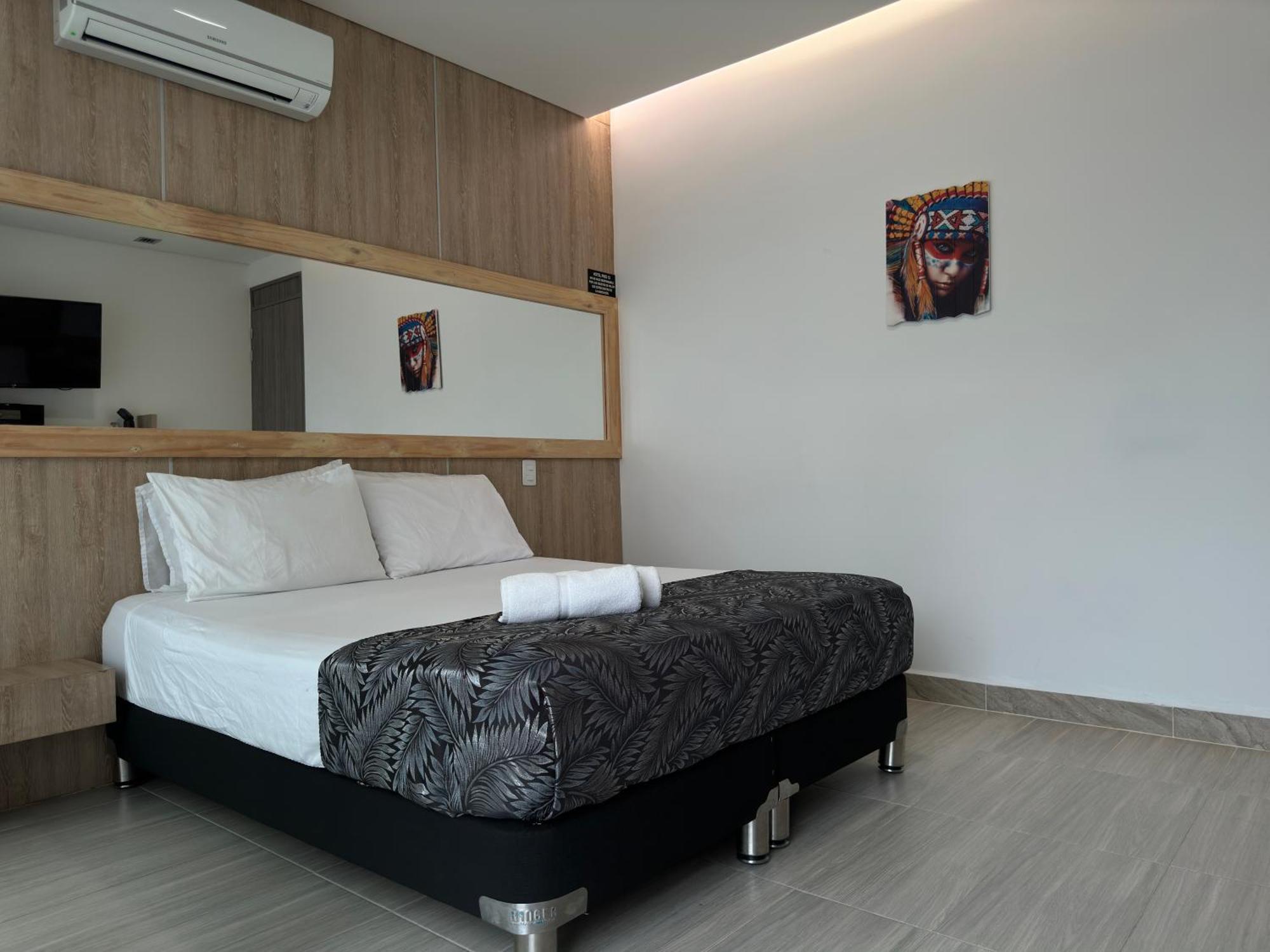 Hotel Piso 12 Bello Buitenkant foto