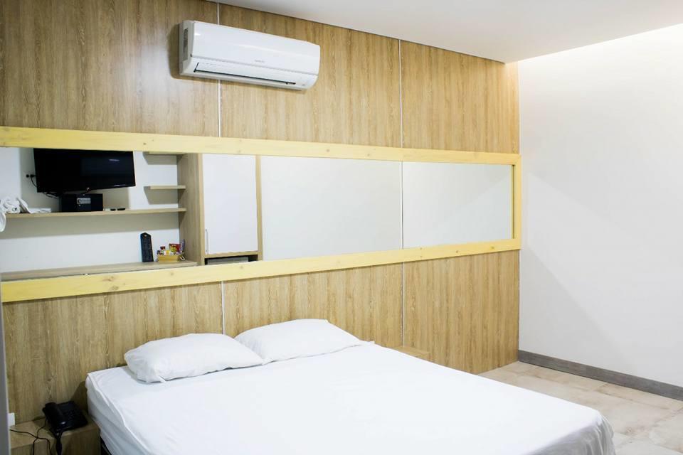 Hotel Piso 12 Bello Buitenkant foto